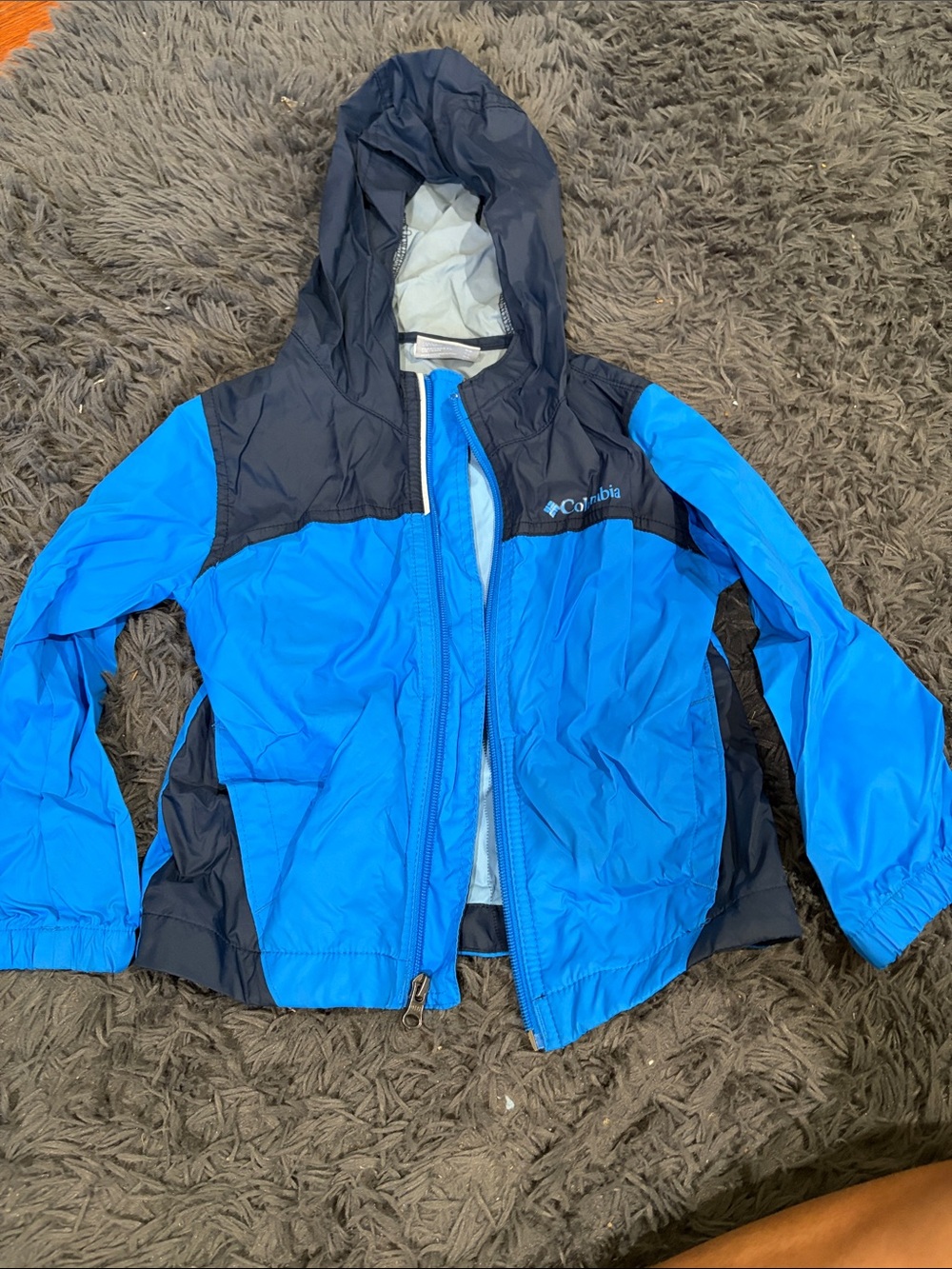 Columbia Boys' Blue and Navy Hooded Rain Jacket. Brand new